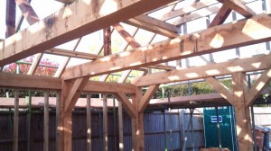 Oak frame complete and roof work is underway